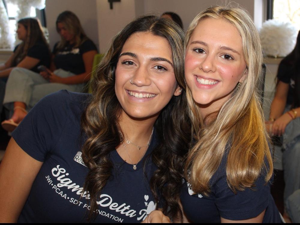 Becky Jenkins (right) with a friend during recruitment for her sorority, Sigma Delta Tau.