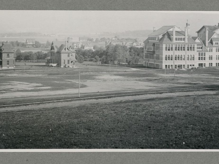 A black and white picture of a college campus in the 1800s