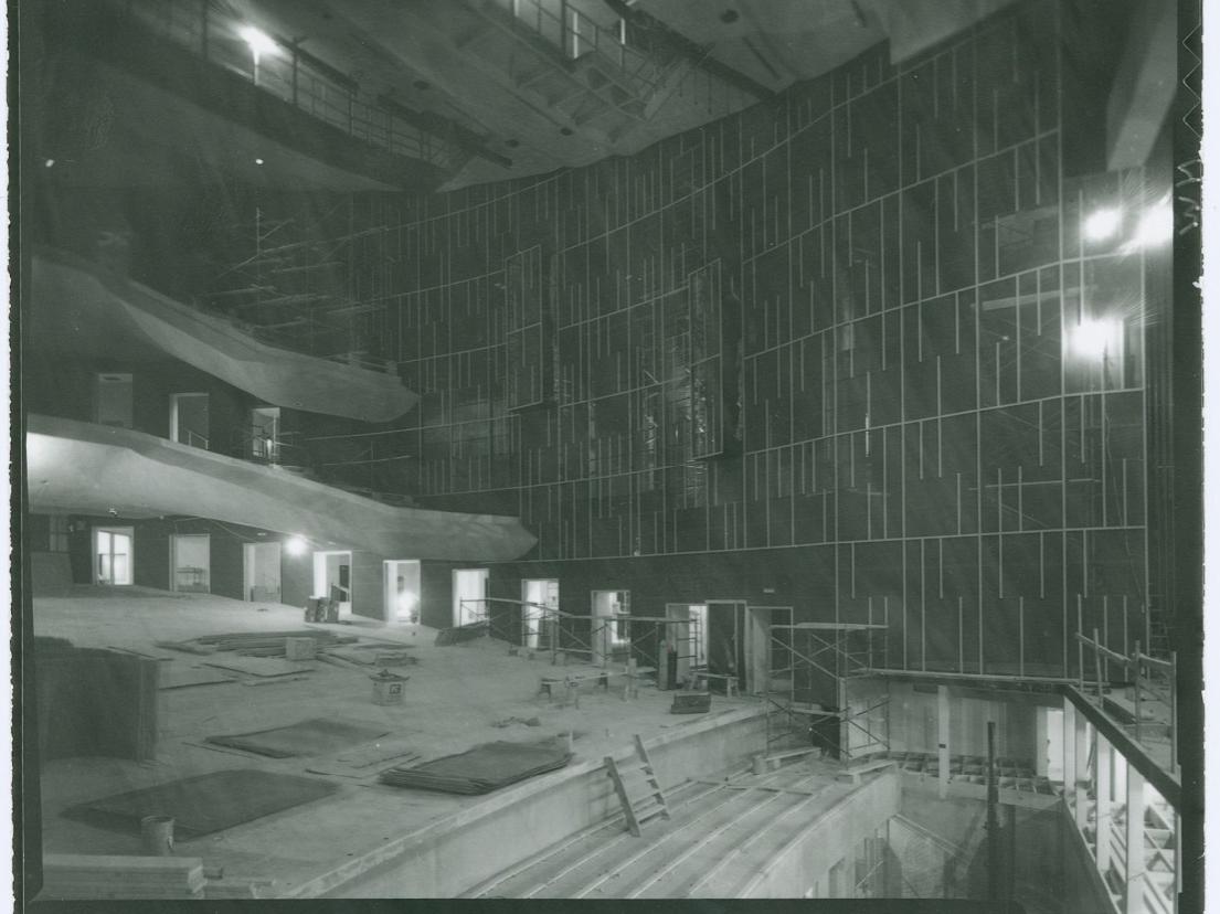 An interior view of an auditorium under construction