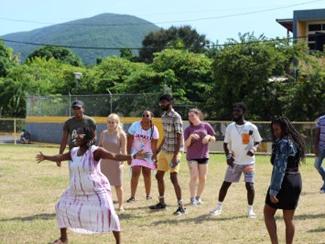 A group of students playing a game outside