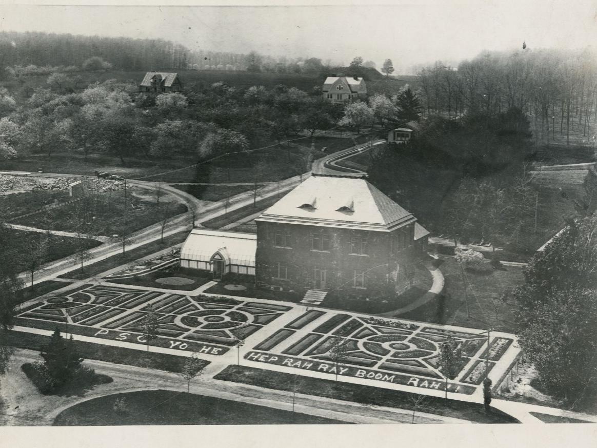 A black and white image of a college building in the 1800s