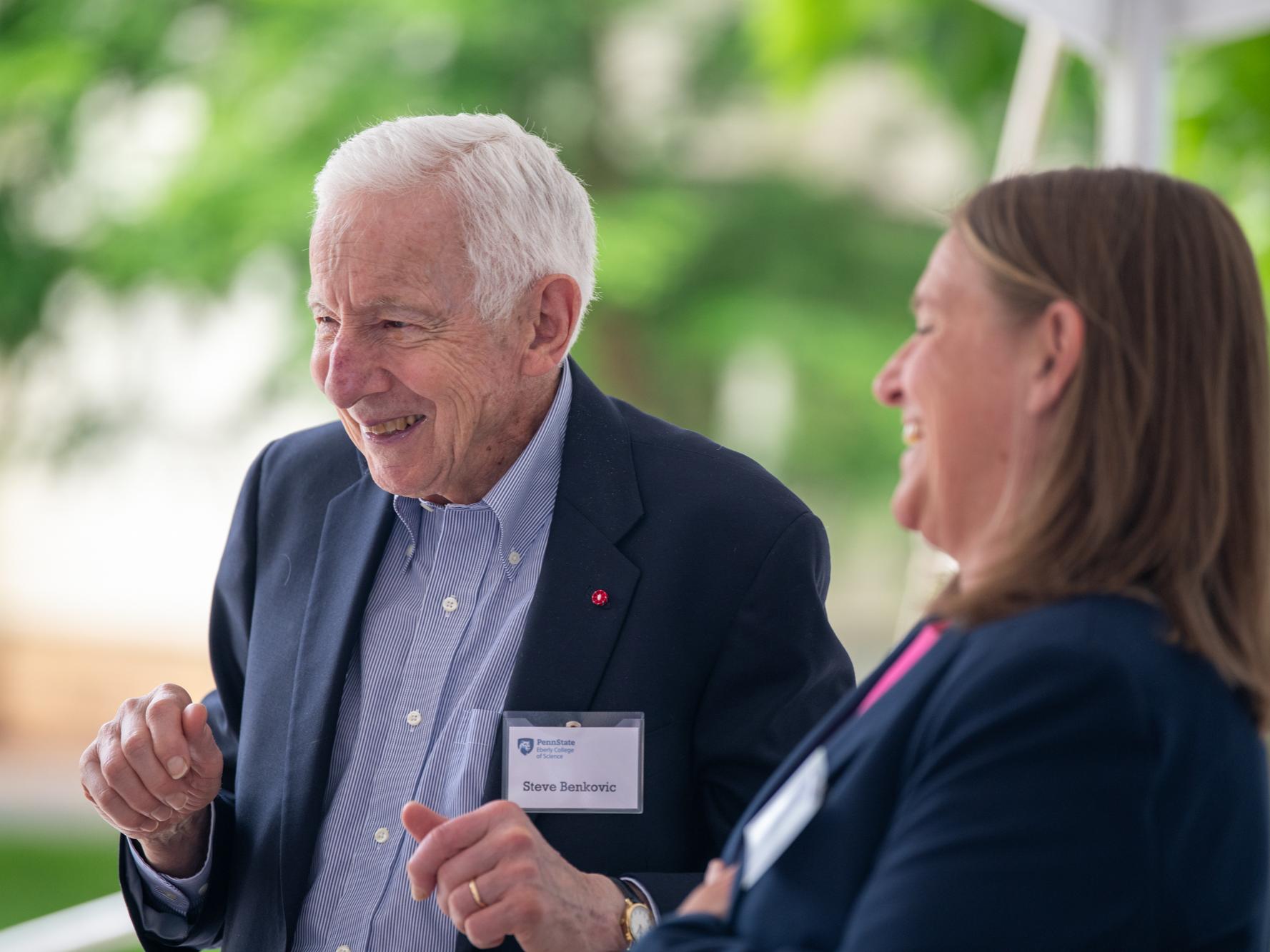 Stephen Benkovic laughing with Mary Beth Williams at Benkovic Building Naming Ceremony