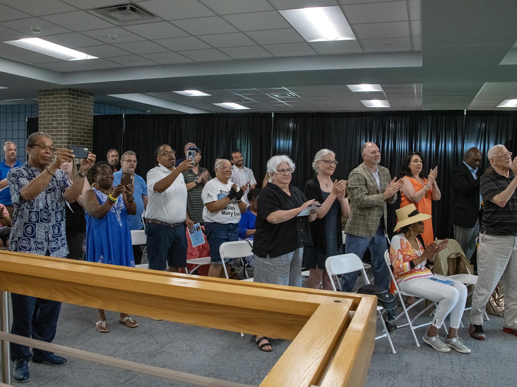 Attendees deliver a standing ovation to Rev. James Lawson Jr's message on unity.