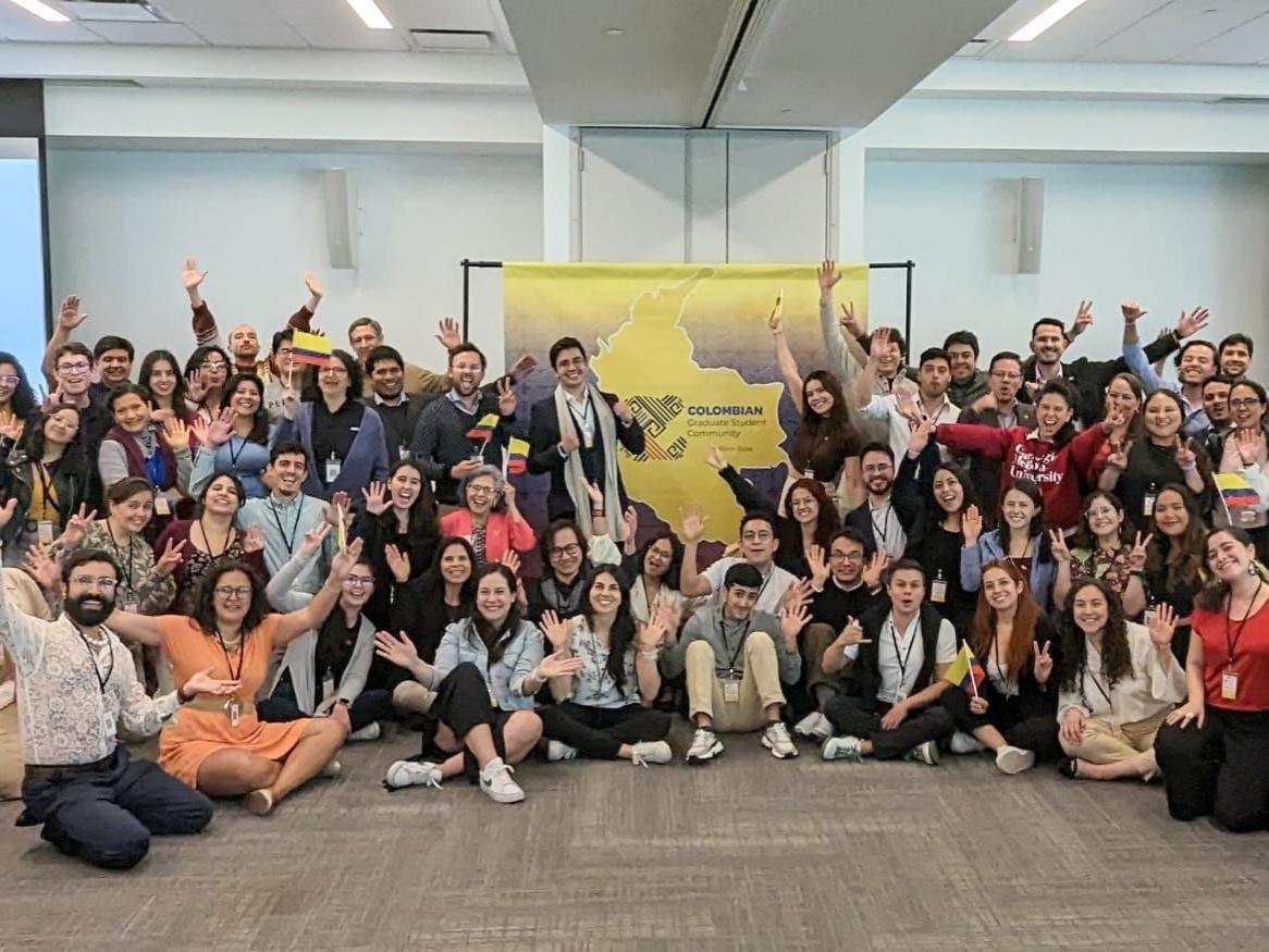 A large group of people posing for a group photo