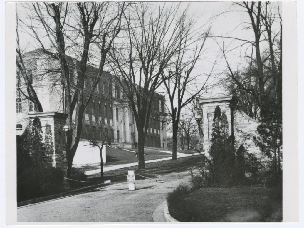 A picture of the main entrance with Sackett Building in the background