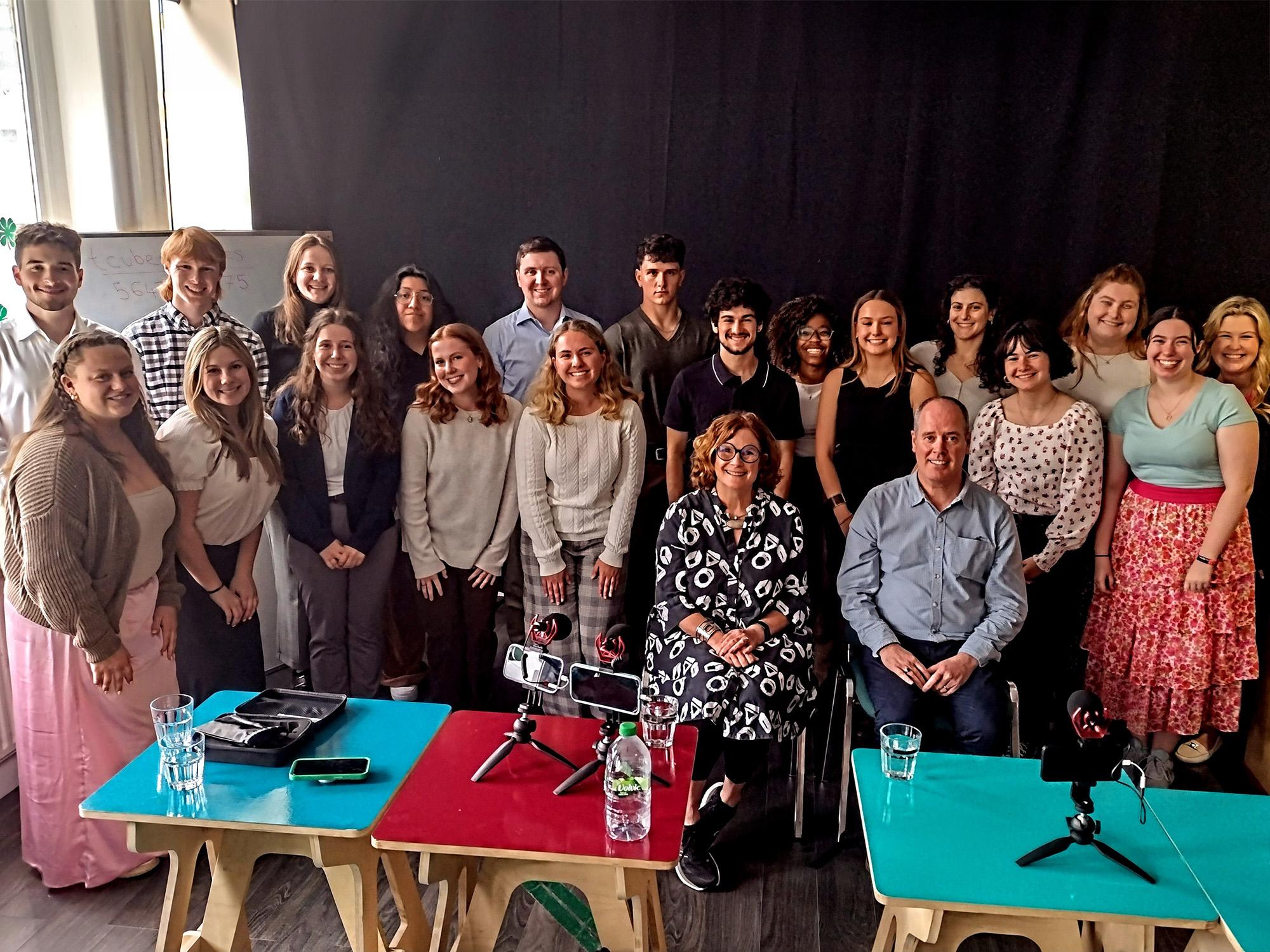 A group of students and faculty pose with 2019 Brown Democracy Medal winners Jane Suiter and David Farrell (seated).