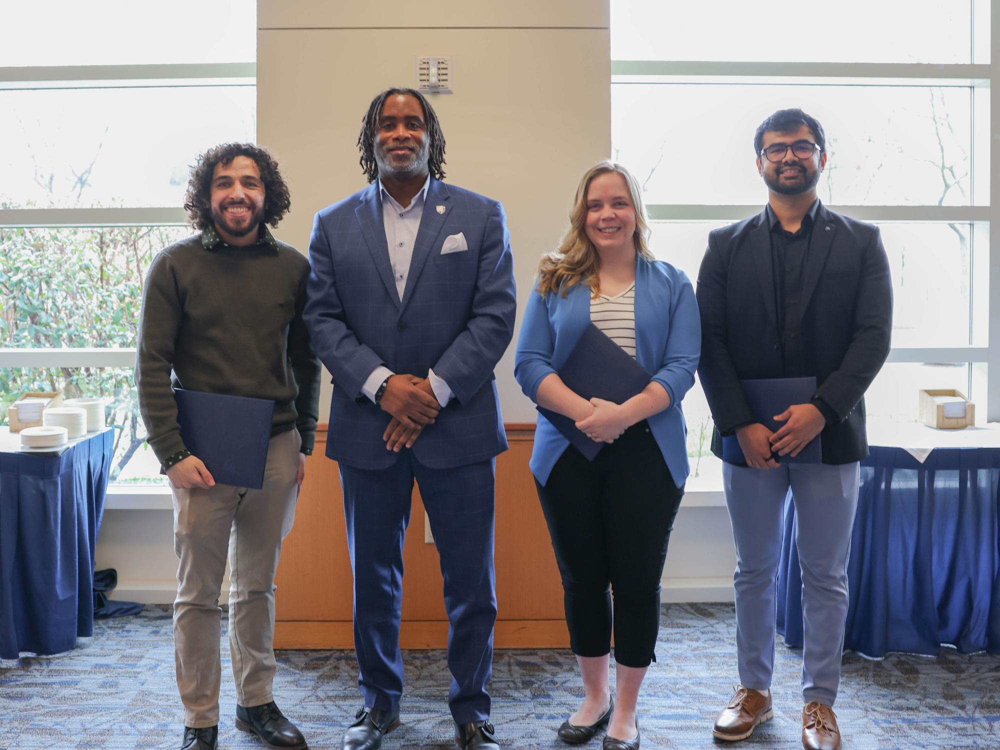 3MT finalists and Dean Esters