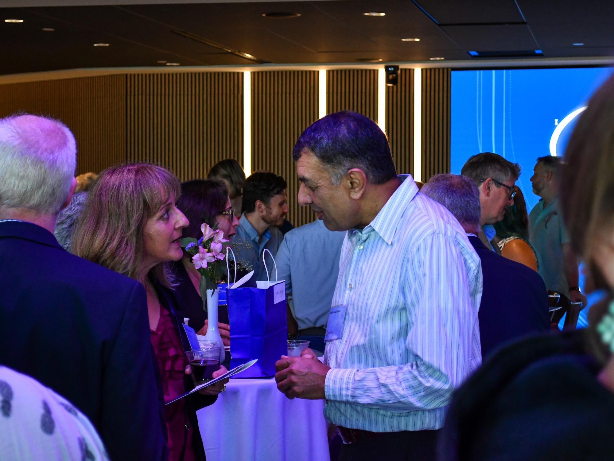 Faculty guests chat