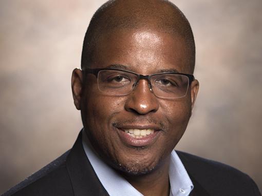 headshot of Phillip W. Graham