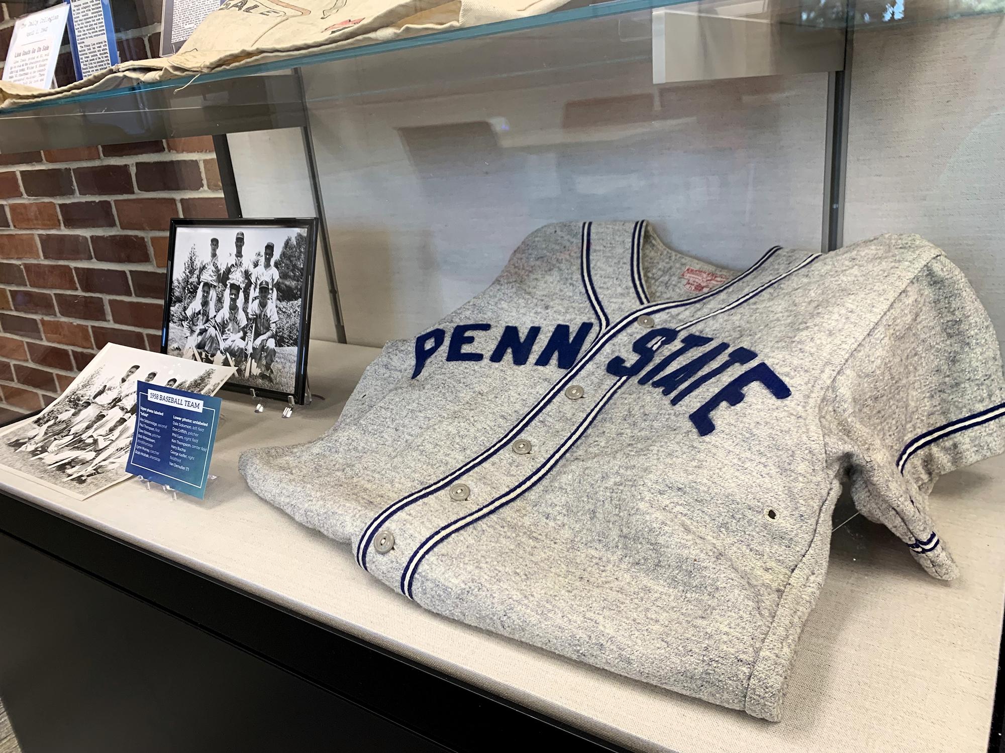 Display of student athletics items from Penn State Mont Alto archives 