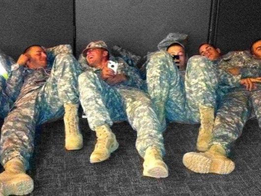 Michael Balmford with fellow soldiers at Fort Campbell, Kentucky, waiting for busses.
