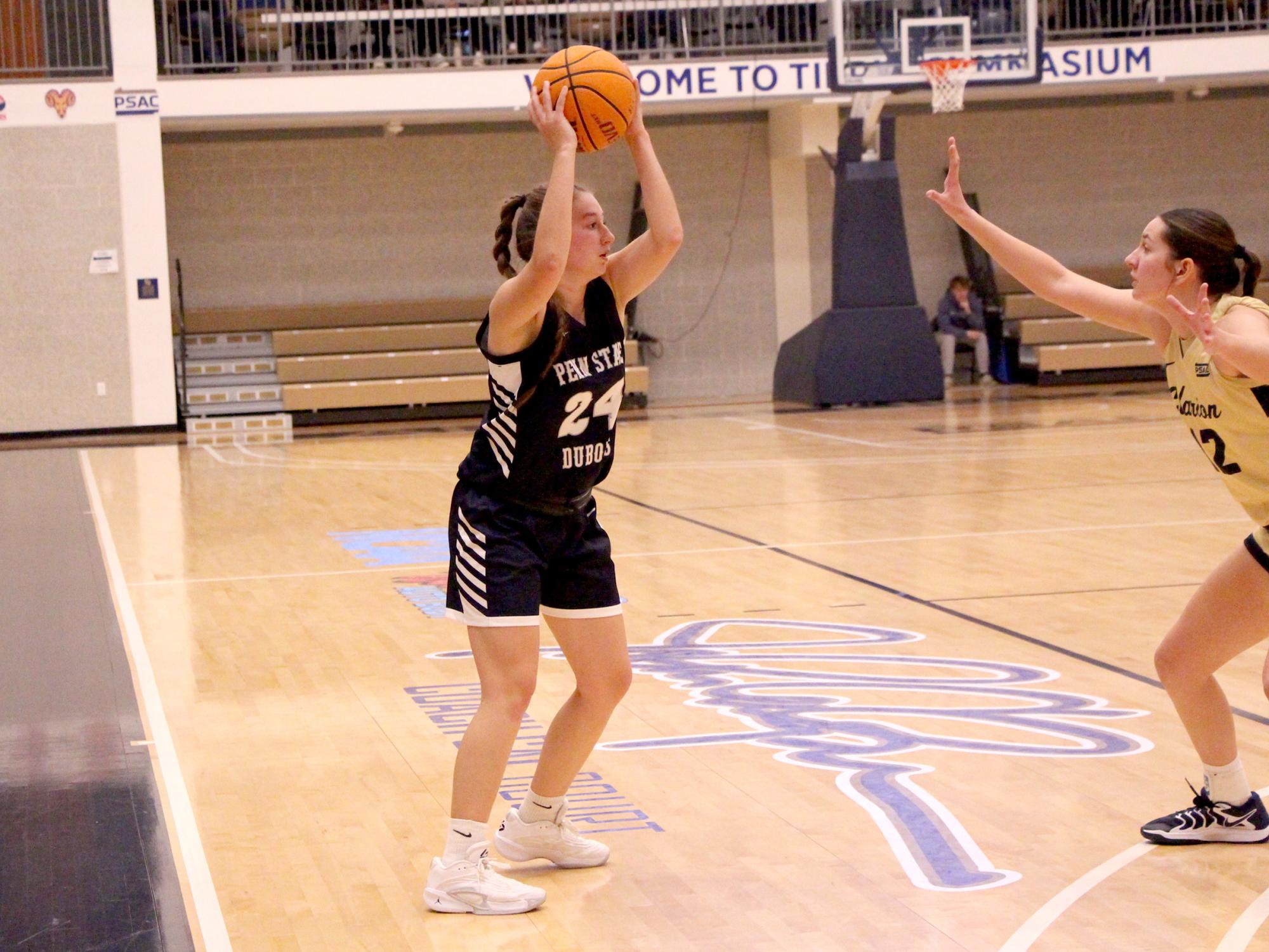 Penn State DuBois sophomore forward Rebecca Martin handles the basketball and looks inside to make a pass during the Lady Lions’ game at Clarion University on Nov. 16.
