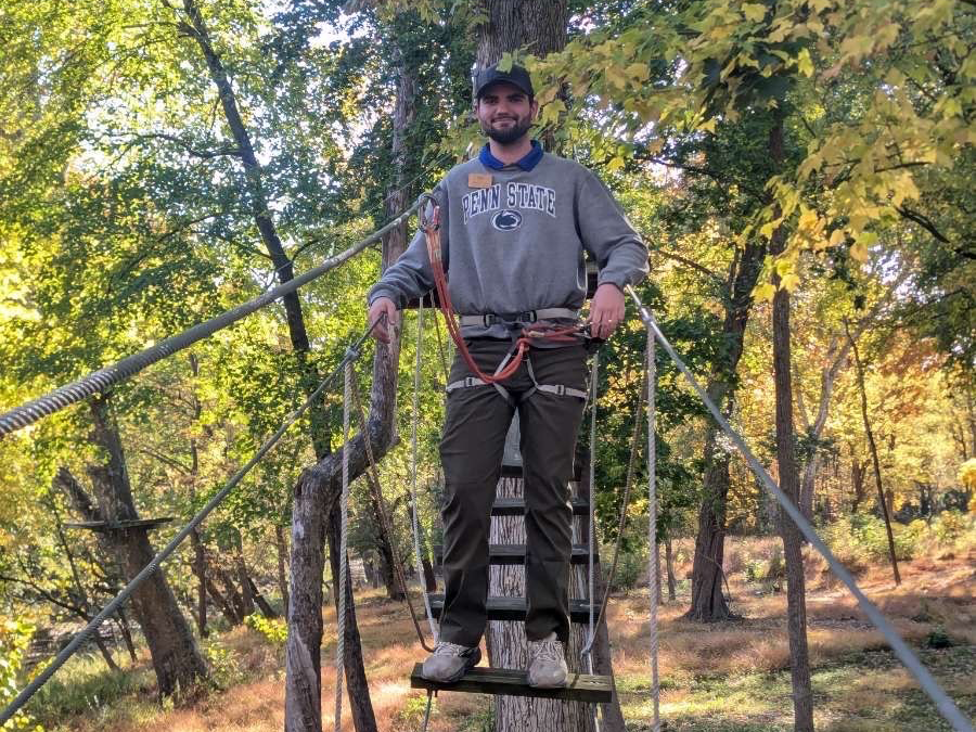 Ethan Stilley on a rope bridge