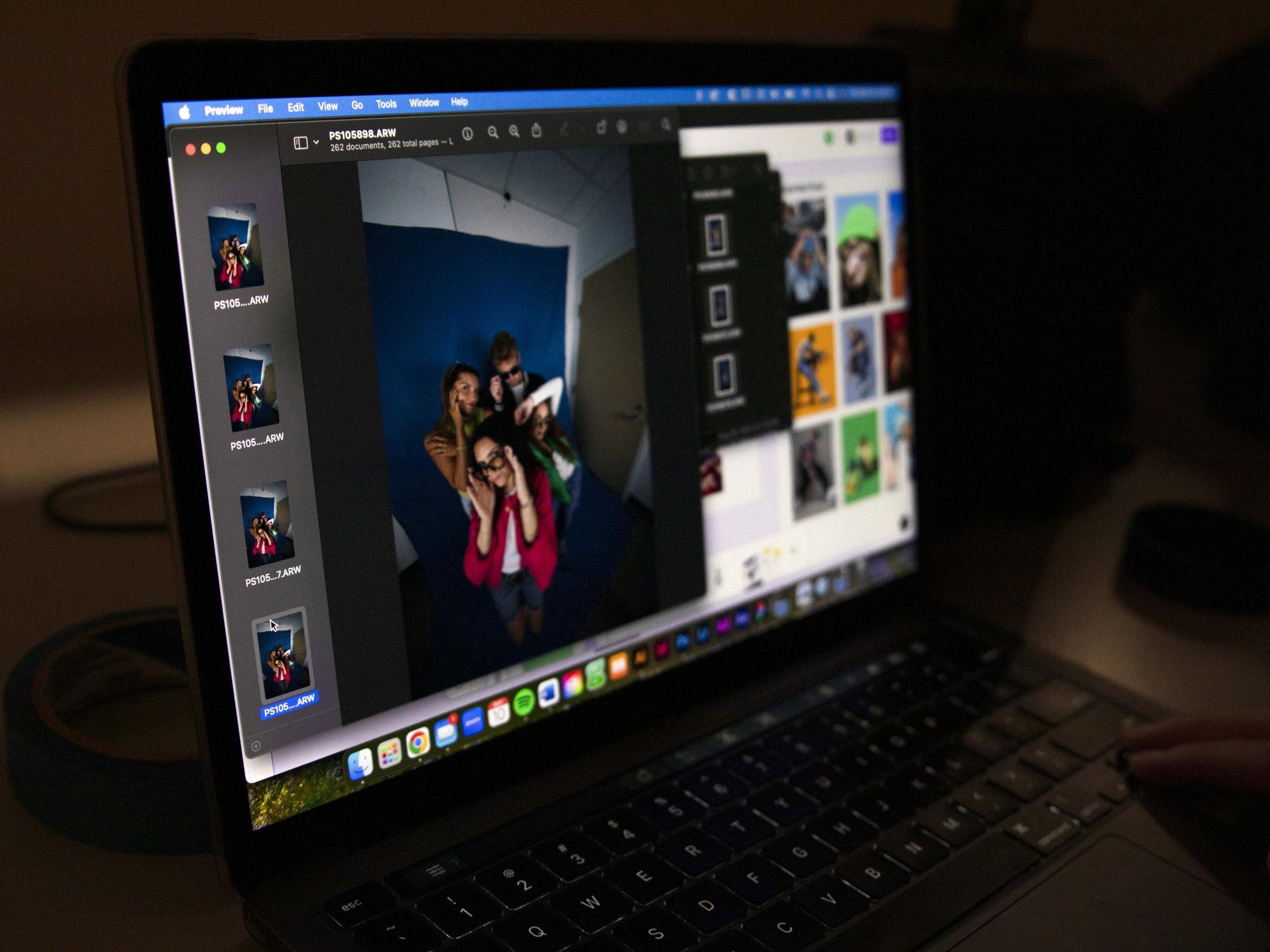A laptop with the Adobe Photoshop app open on the screen. 