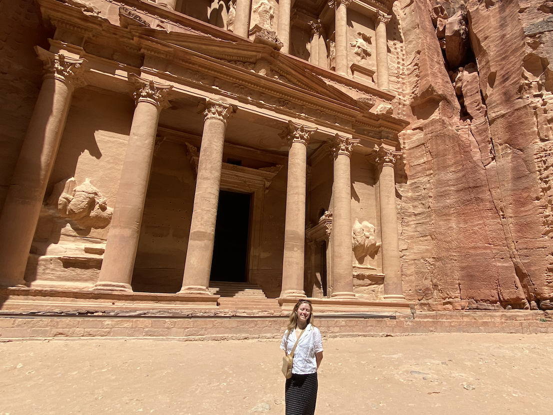 Jessica Krieger stands in front of Petra, a famous archaeological site in Jordan's southwestern desert.