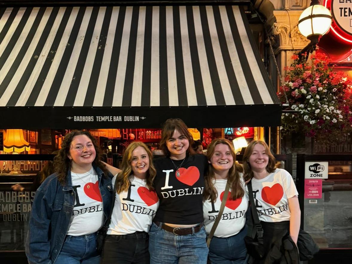 Teagan Mayr (second to right) posing with four friends wearing matching “I heart Dublin” shirts.