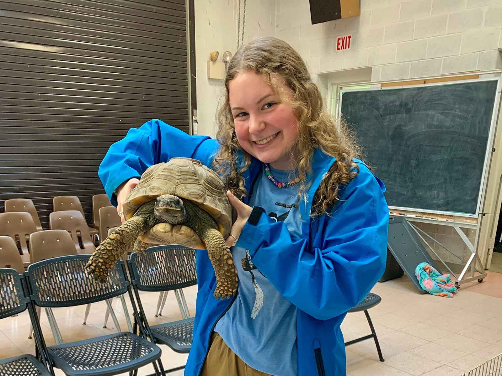Sarah Zurn holding a tortoise