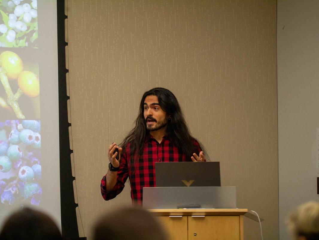 A student presents during the podium session at the Biology and Ecology Student Research Showcase on Nov. 1, 2024.