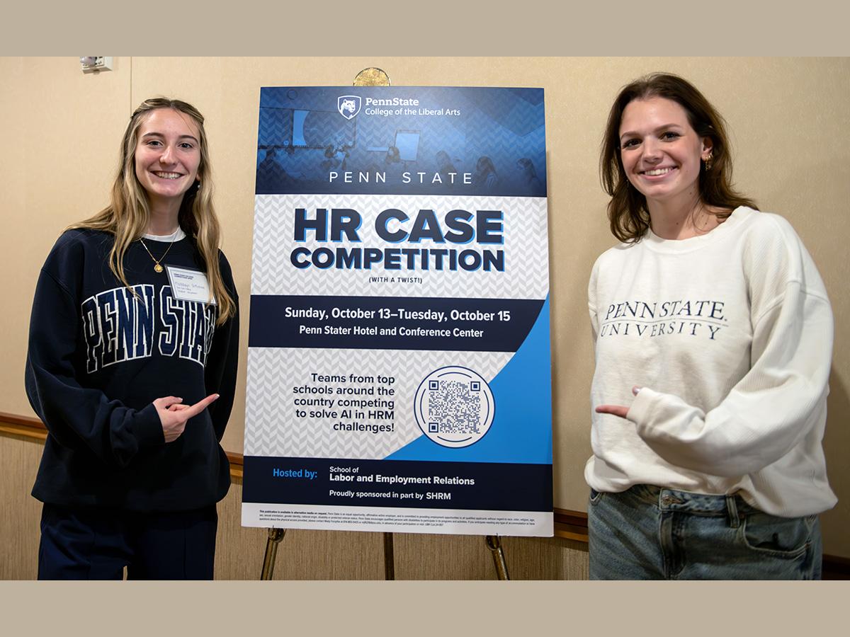 Photo of Maddalyn DiMichele on left and Makenna Kane on right who were student volunteers for HR Case Competition