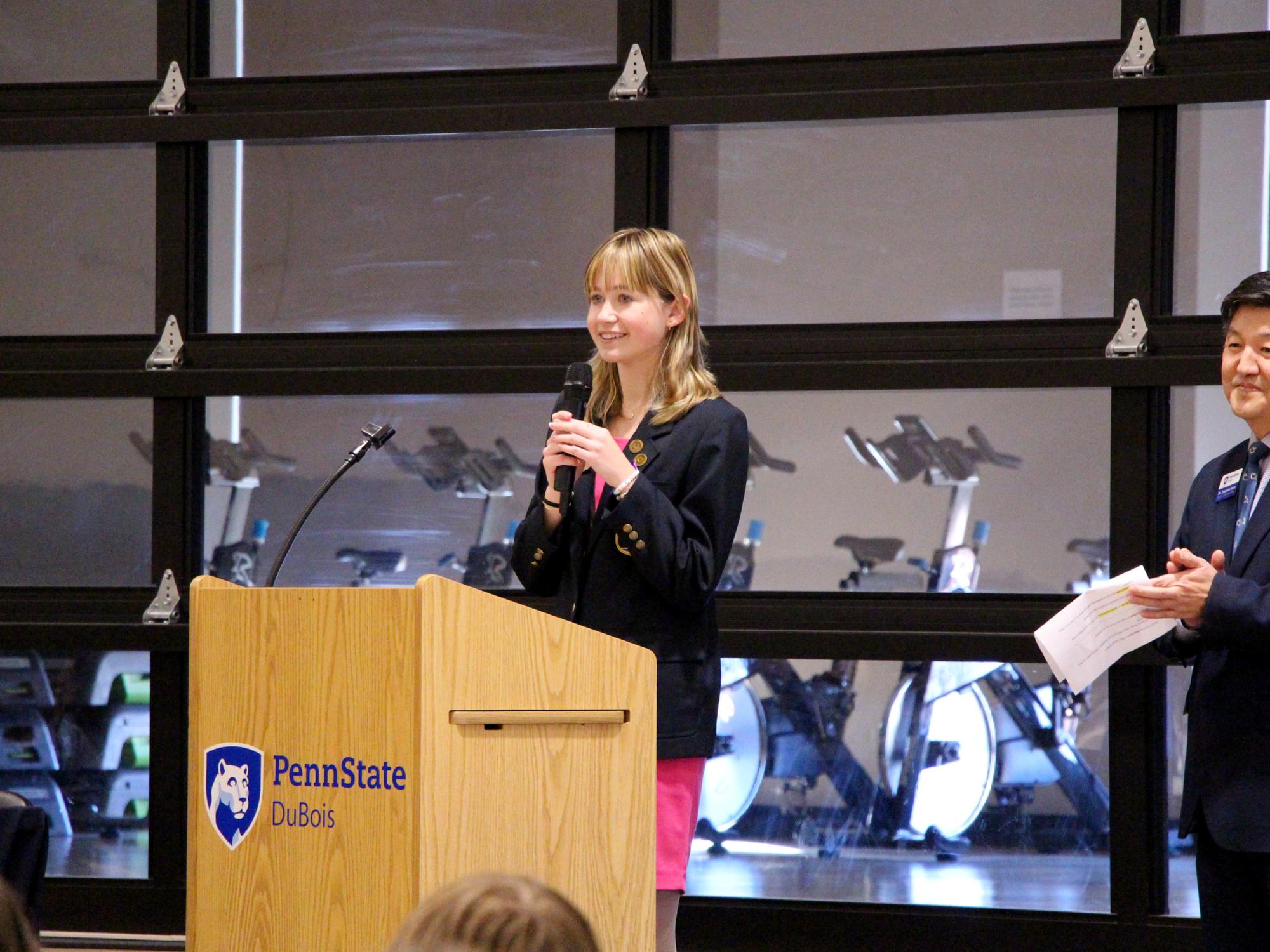 Madigan McGrath, Ridgway student and District 1 representative for Pennsylvania DECA, offers her welcome message at the start of district’s annual conference, held at Penn State DuBois.