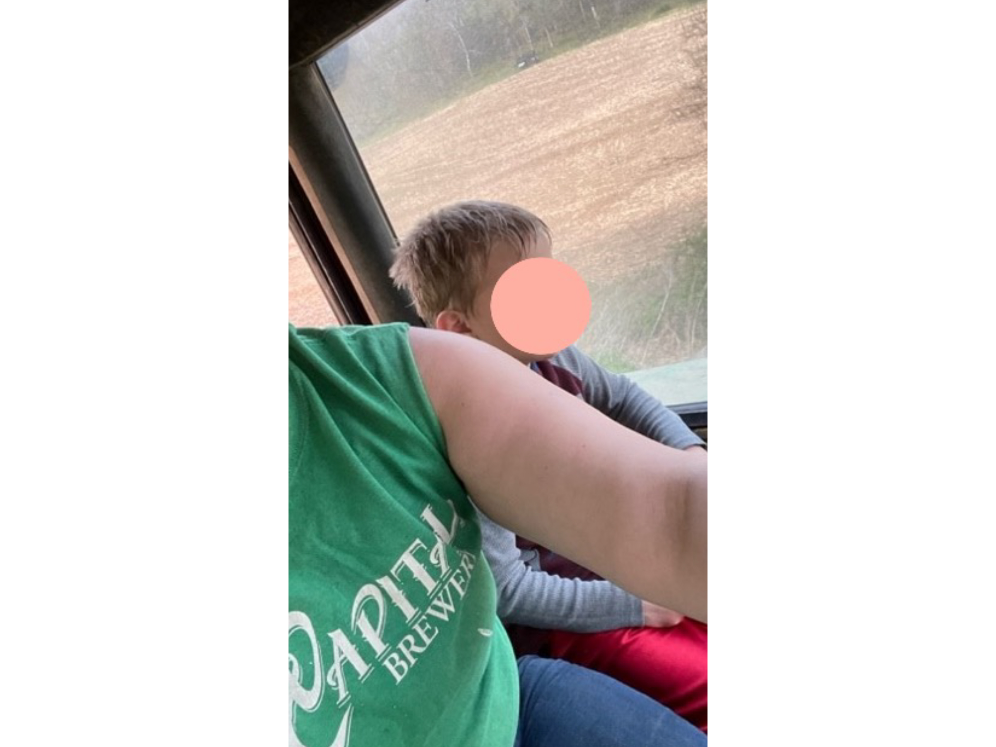 People riding in tractor