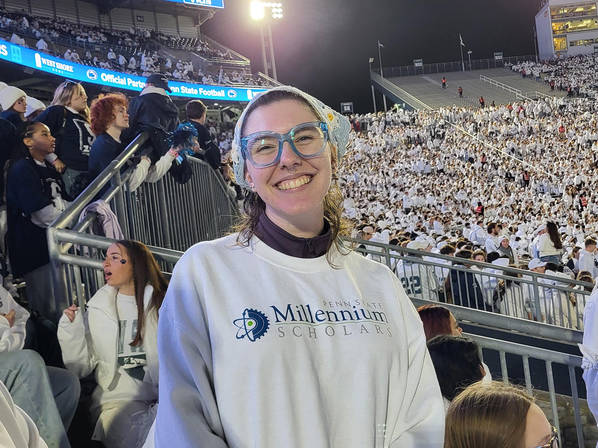 Geosciences student Ava Yurchak attends a Penn State football game.