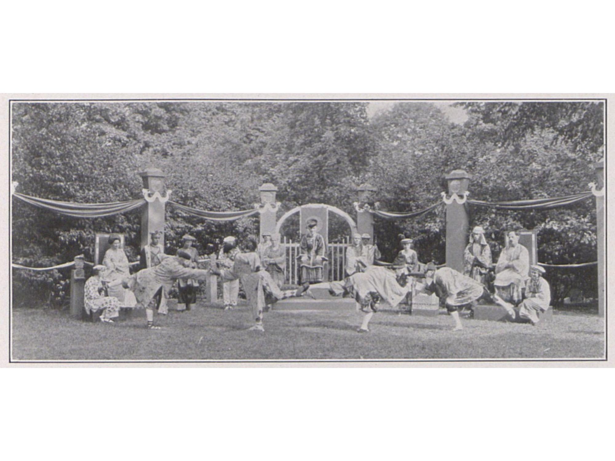 A black and white image of a play in an open air theater in the early 1920s