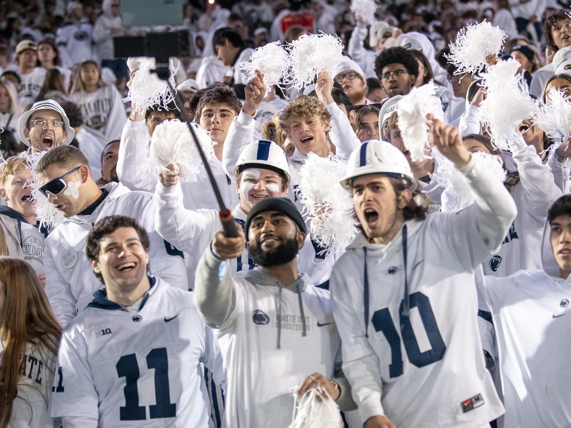 football fans selfie at white out