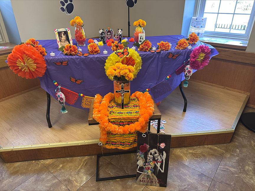 A decorated ofrenda on a table.