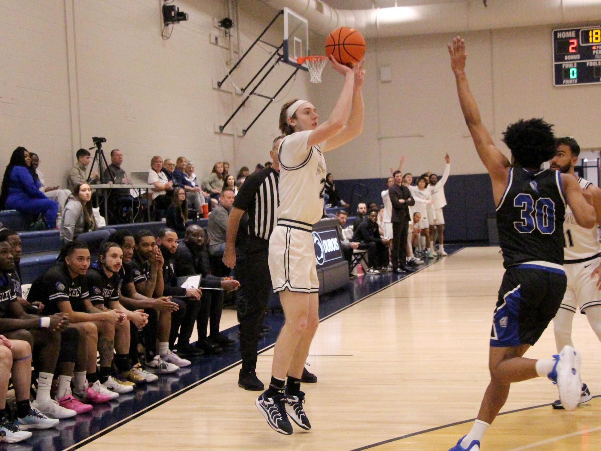 Penn State DuBois senior forward Beau Verdill shoots a three pointer during a home game against Berkeley College at the PAW Center.