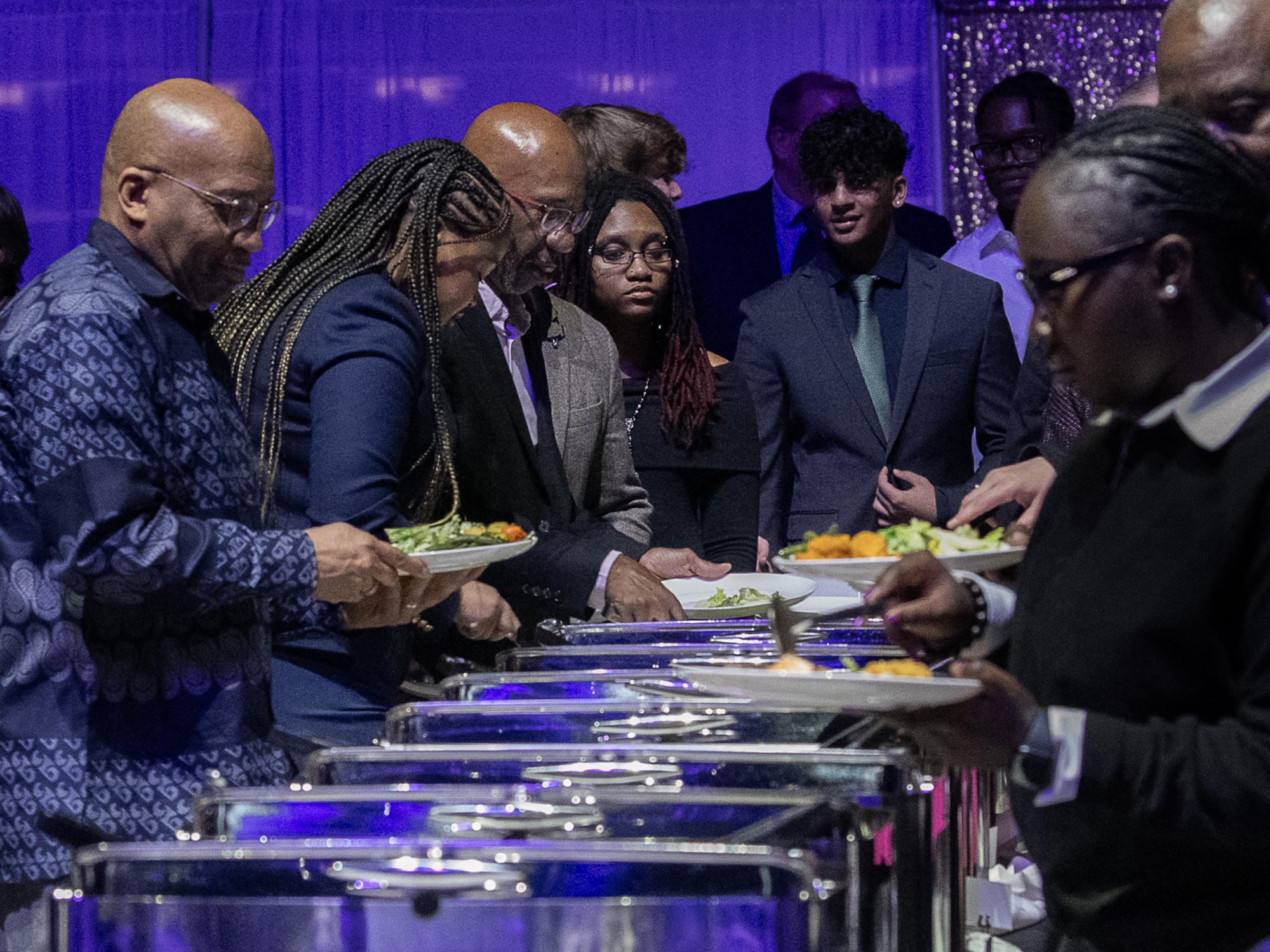 guests getting food at Martin Luther King banquet