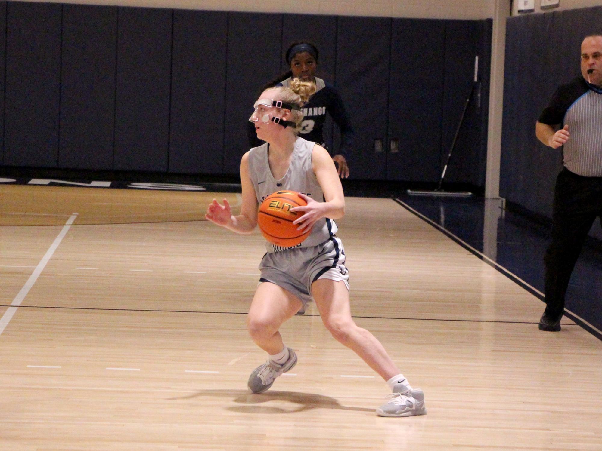 Penn State DuBois sophomore guard Hailey Theuret handles the basketball at the top of the key during a recent home game at the PAW Center.