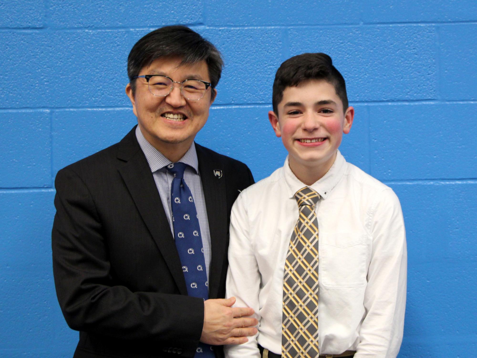 Angelo Yost, right, from Saint Marys stands with Jungwoo Ryoo, chancellor and chief academic officer at Penn State DuBois. Yost received two individual awards for his performance during the 26th annual Junior Scholastic Challenge, held at Penn State DuBois.