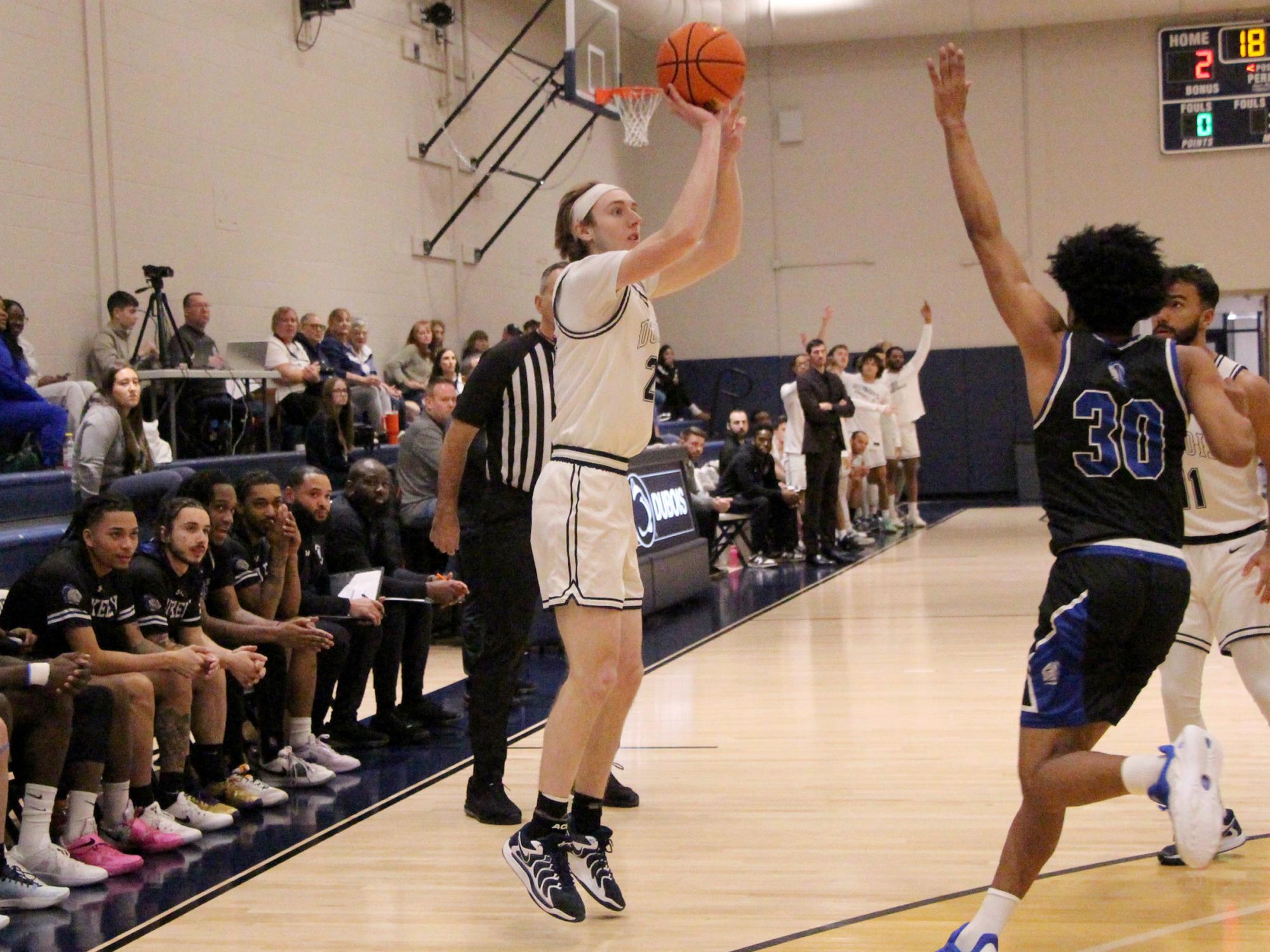Penn State DuBois senior forward Beau Verdill gets a contested three pointer away during a recent home game at the PAW Center, on the campus of Penn State DuBois.