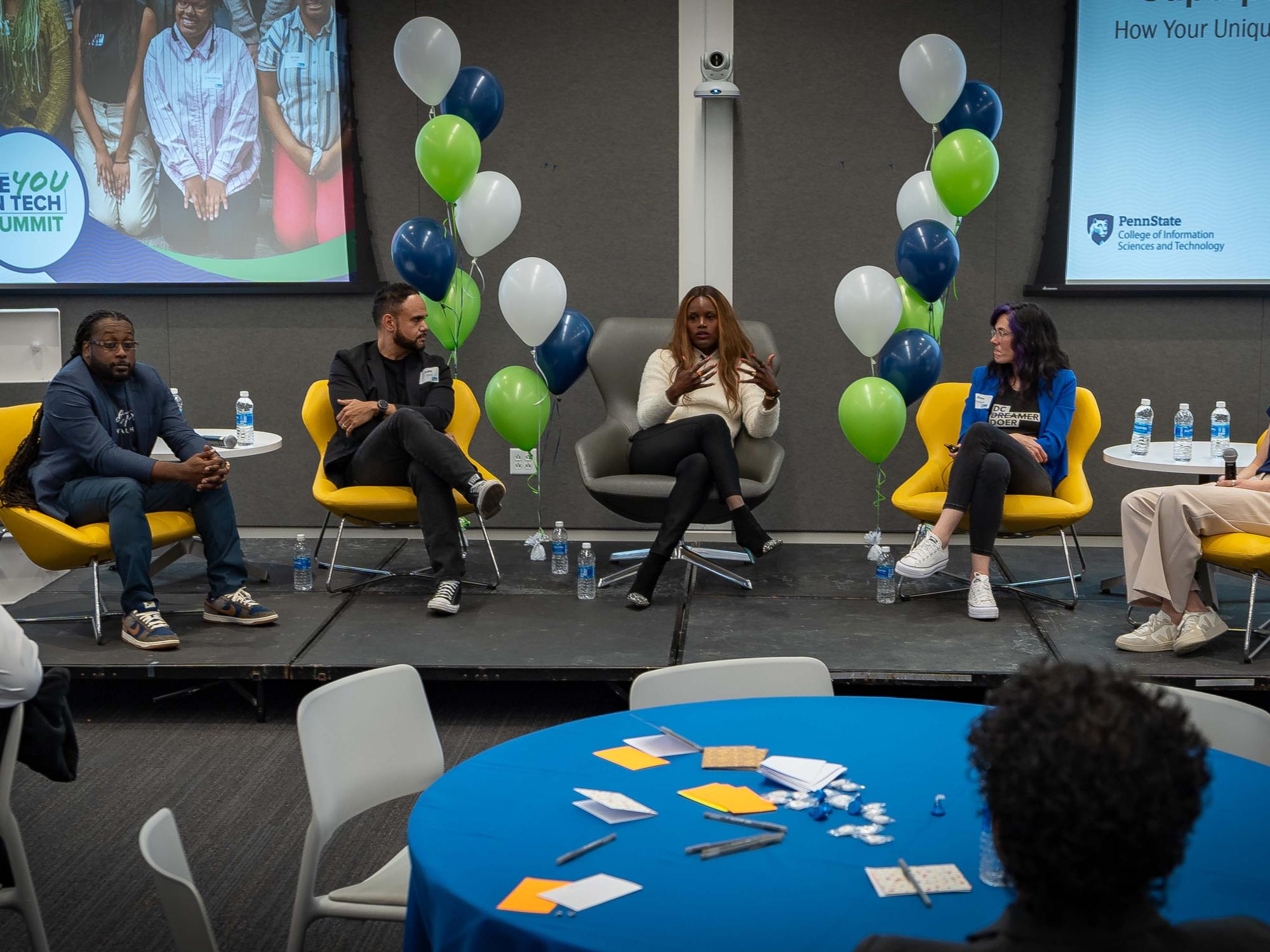five panelists at a conference