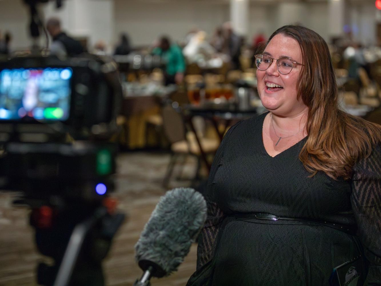 Ashlie Crosson does a television interview.