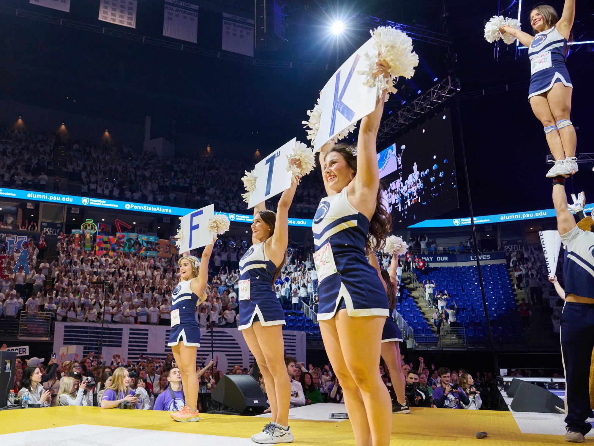 Penn State Cheerleaders performing on stage during THON
