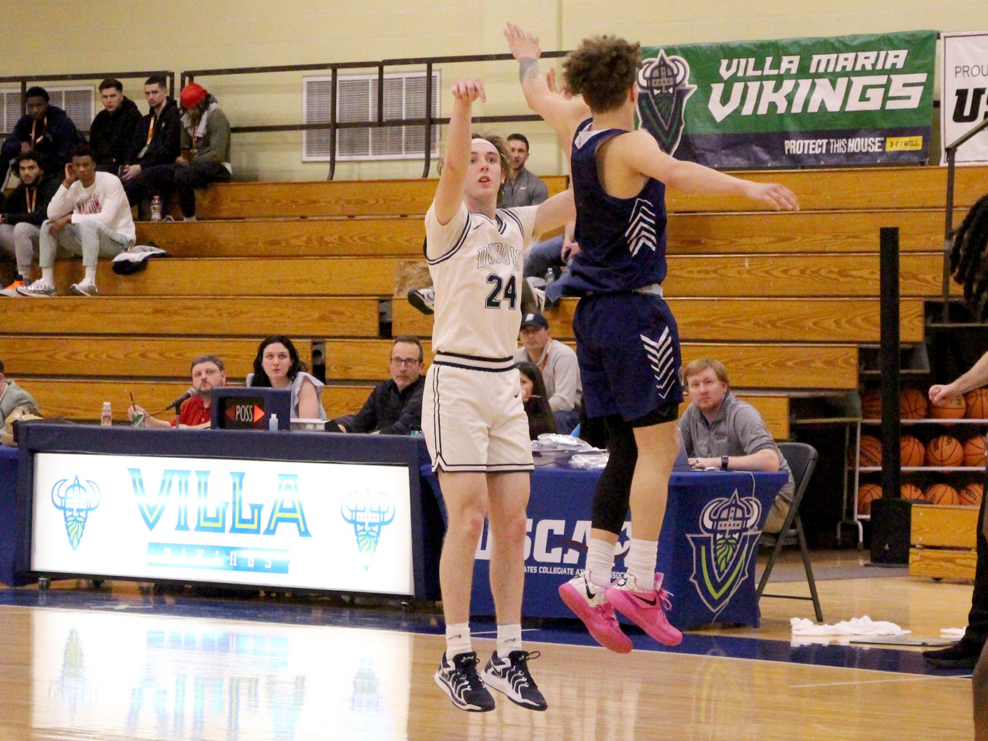 Penn State DuBois senior forward Beau Verdill shoots a three-point field goal attempt during a game in the USCAA national championship tournament in Buffalo, NY.