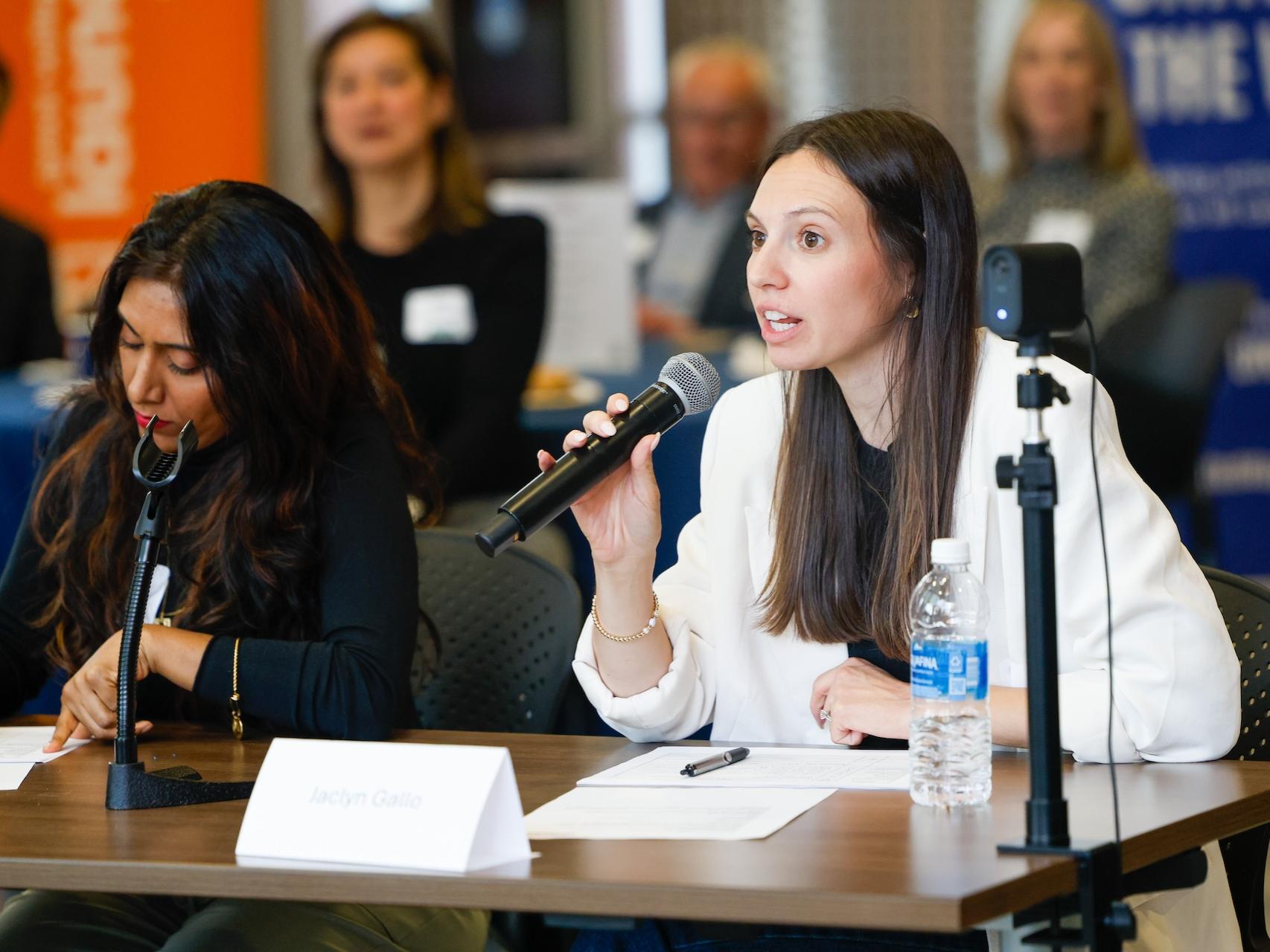 lady speaking into microphone