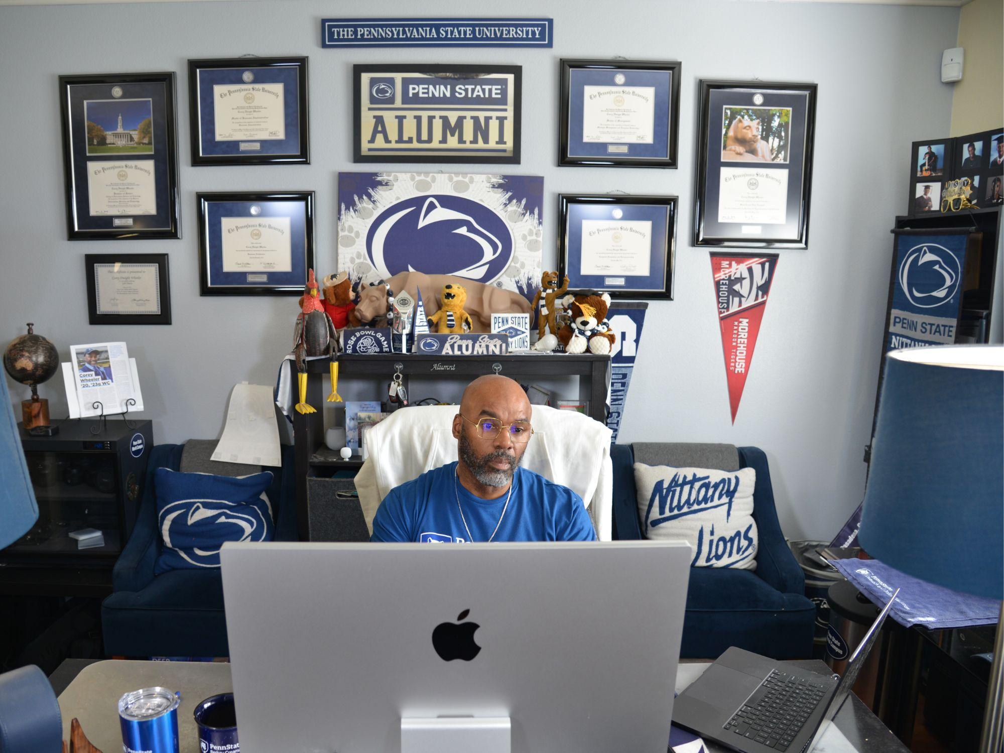 Corey Wheeler works at a desk