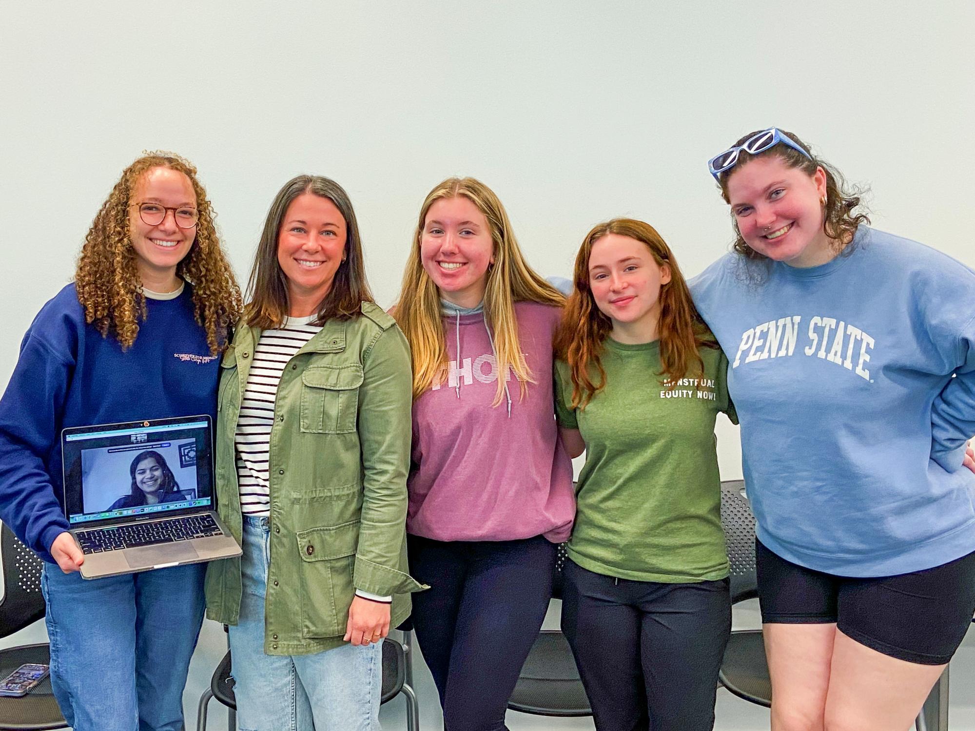 Emily Cotrufello (right) and three other Days for Girls at Penn State executive board members stand with Lori Holencik, PA-C, (second from left) after a presentation on birth control during one of their meetings in fall 2023.