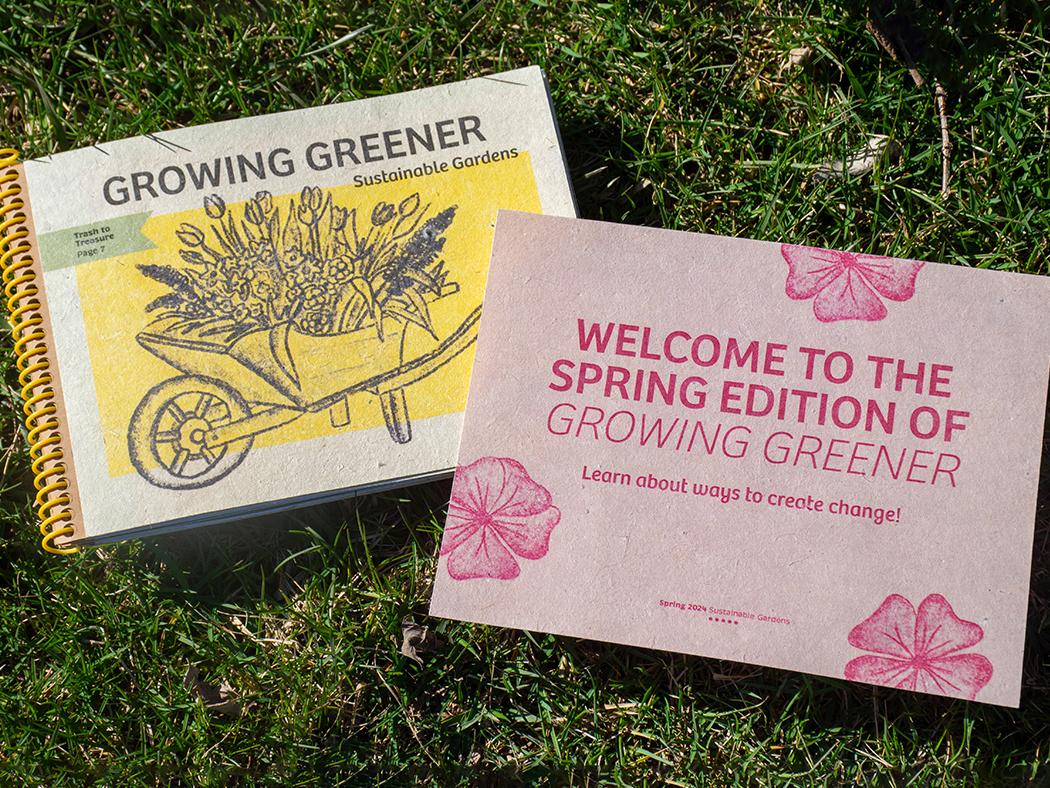 A publication called "Growing Greener" and a flyer promoting the publication atop grass.
