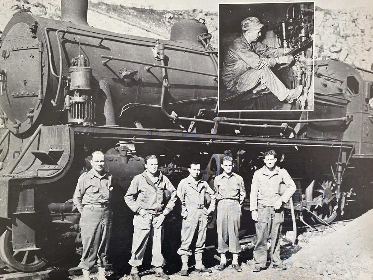 This wartime image shows John Halloran (second from right) overseeing military railroad operations in France.