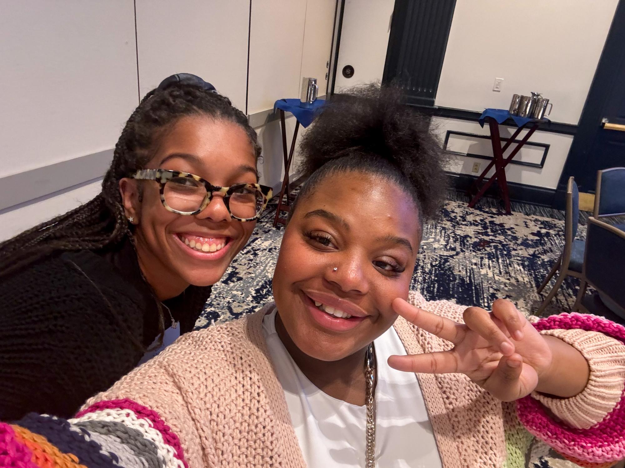 Laci Campbell (left) and her Chaiken Scholars mentee Trinidy Mansion (right) pose for a selfie.