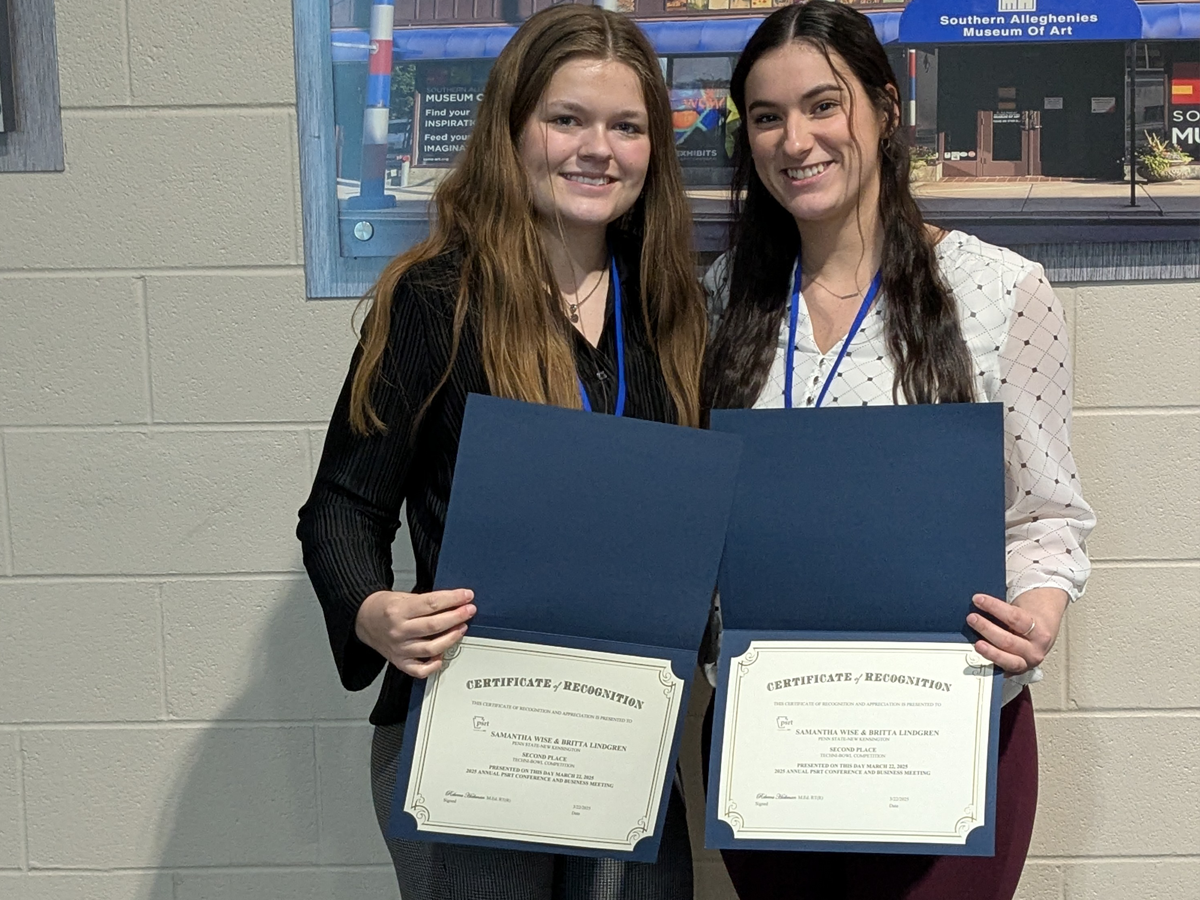 Penn State New Kensington students Britta Lindgren and Samantha Wise hold certificates after placing second in the Techni-Bowl competition at the 2025 PSRT conference.