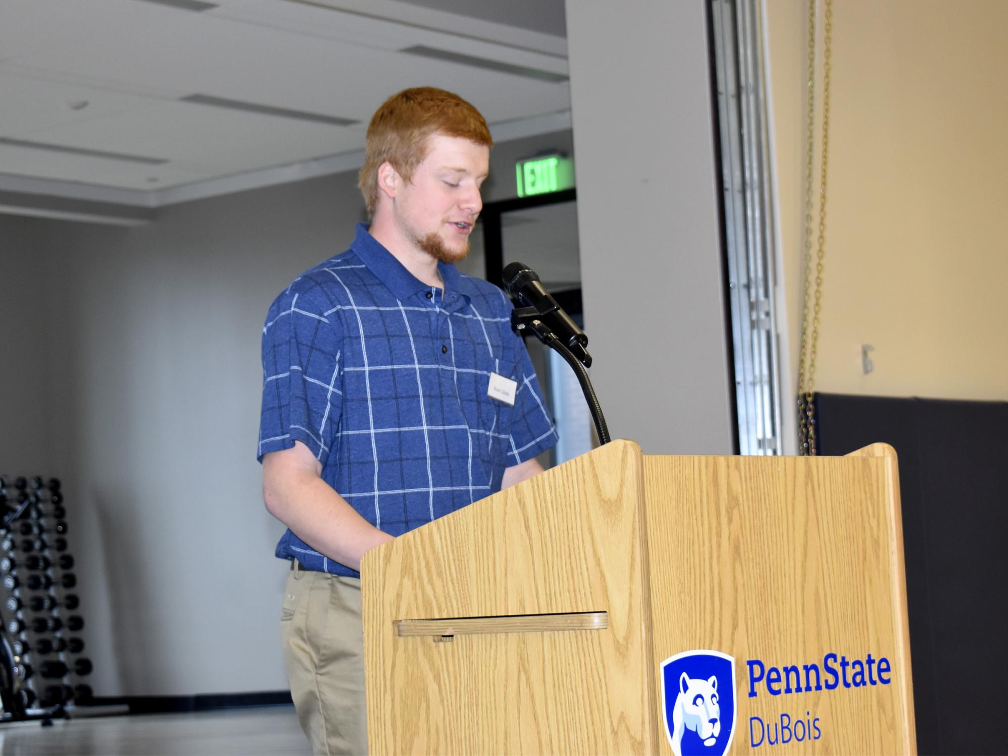 Penn State DuBois student Noah Gibble speaks during the scholarship luncheon at the PAW Center.