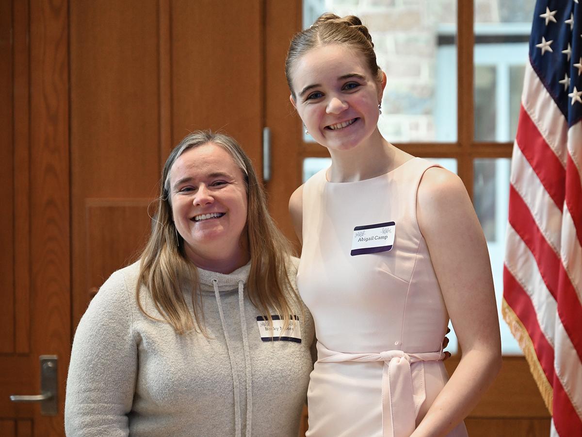 Abigail Camp receives an award from presenter Becky Moore.