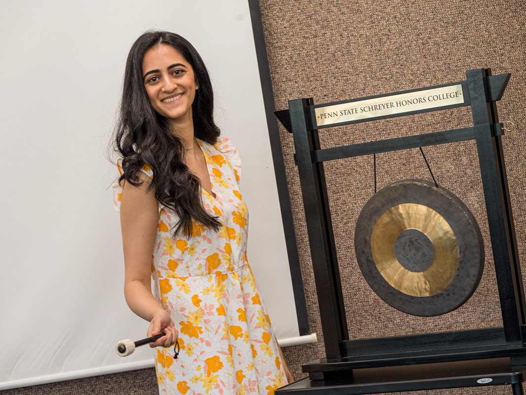 Khushi Patel rings the gong at Penn State Harrisburg