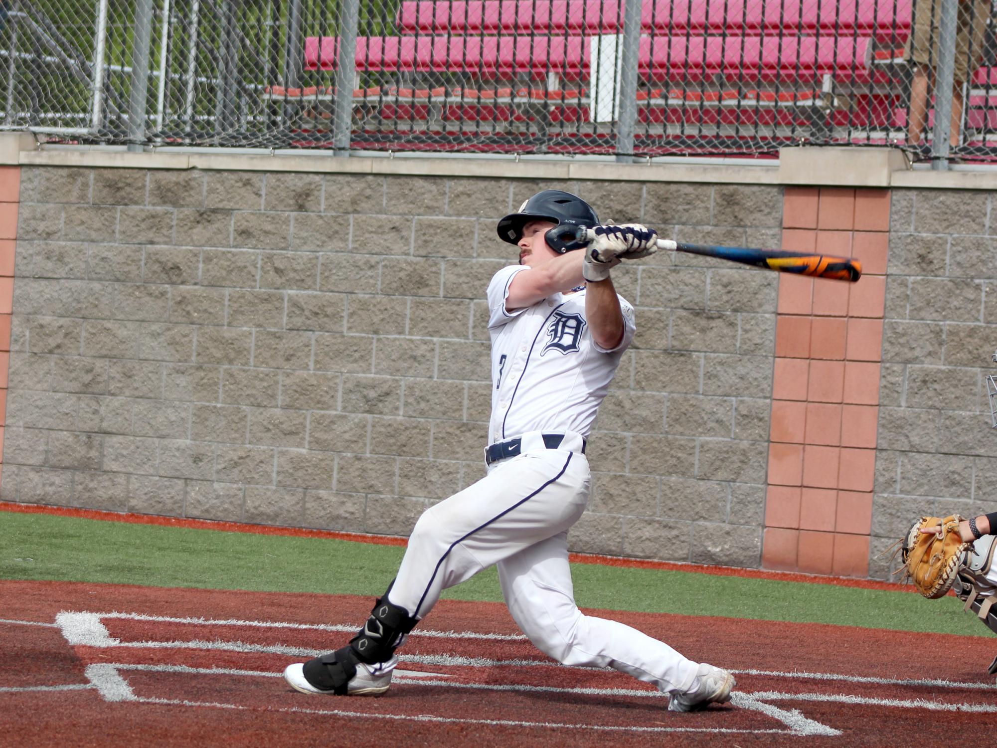 Penn State DuBois junior infielder Kyle Elensky follows through on his swing during a game in the USCAA Small College World Series, held at Showers Field in DuBois.