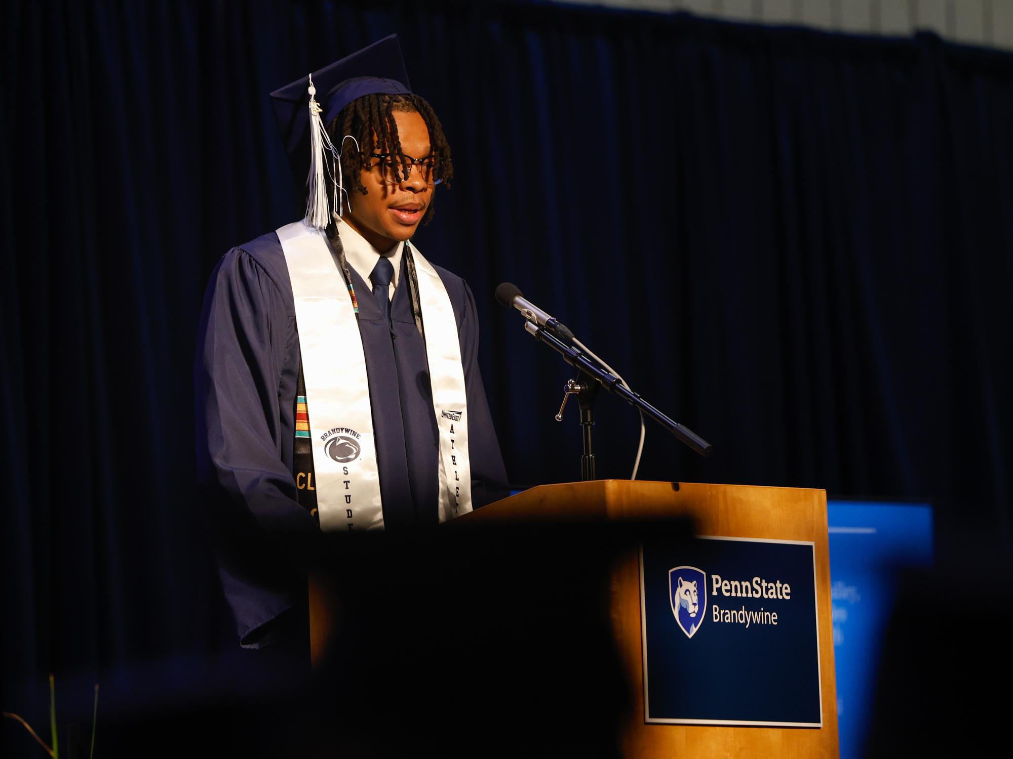 A student speaks at commencement.